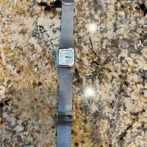 Skagen Denmark stainless steel and mother of pearl with cubic zirconia crystals.